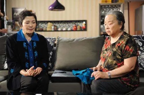 如何评价李明启?